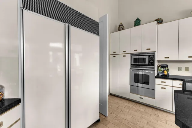 a view of a city with a lake