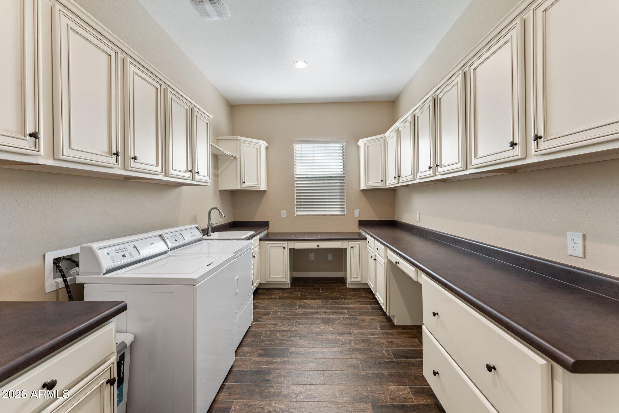 3675 Gold Ridge Road Wickenburg, AZ 85390 - Photo 30 of 58 a kitchen with granite countertop a sink stainless steel appliances and cabinets