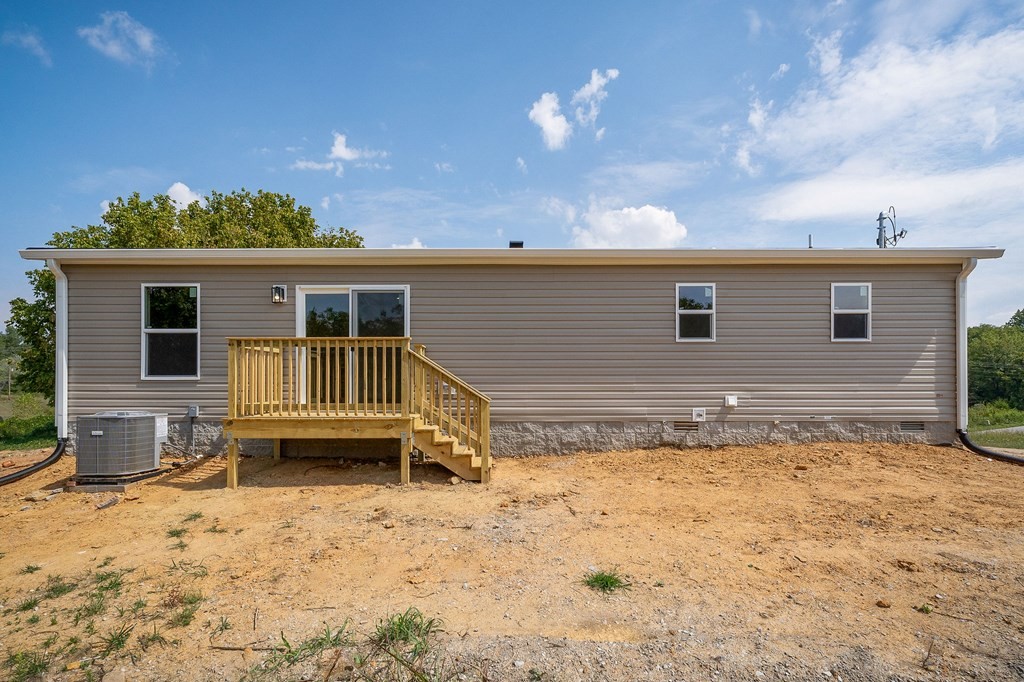 9107 Barnes Ridge Road Monroe, TN 38573 - Photo 5 of 30 a view of a house with a yard