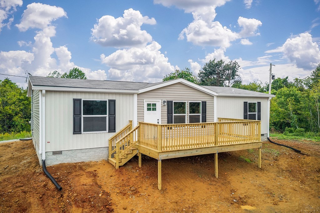 9107 Barnes Ridge Road Monroe, TN 38573 - Photo 6 of 30 a view of a house with a yard