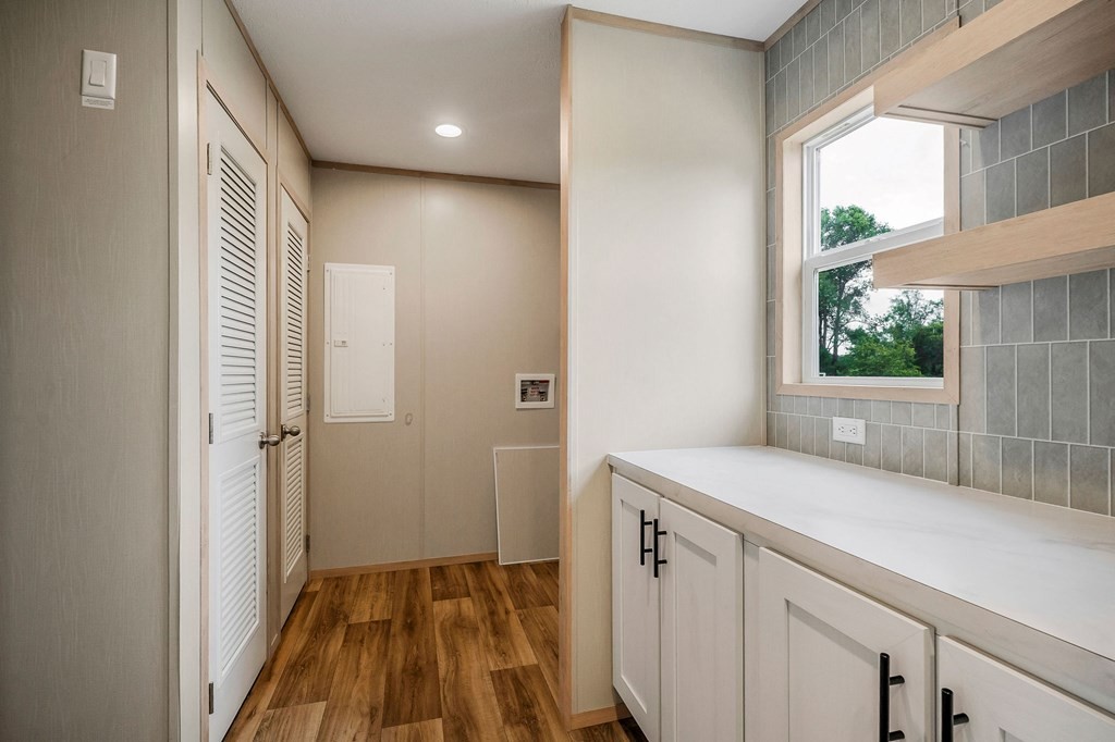 9107 Barnes Ridge Road Monroe, TN 38573 - Photo 10 of 30 a view of a kitchen from the hallway