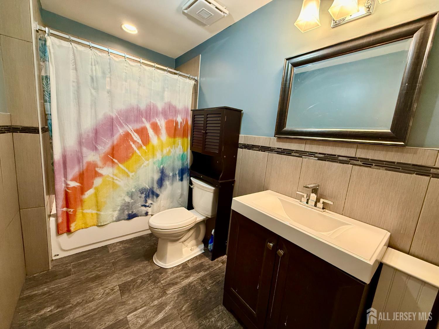 127 Disbrow Road Old Bridge, NJ 07747 - Photo 27 of 50 a bathroom with a sink vanity mirror and toilet