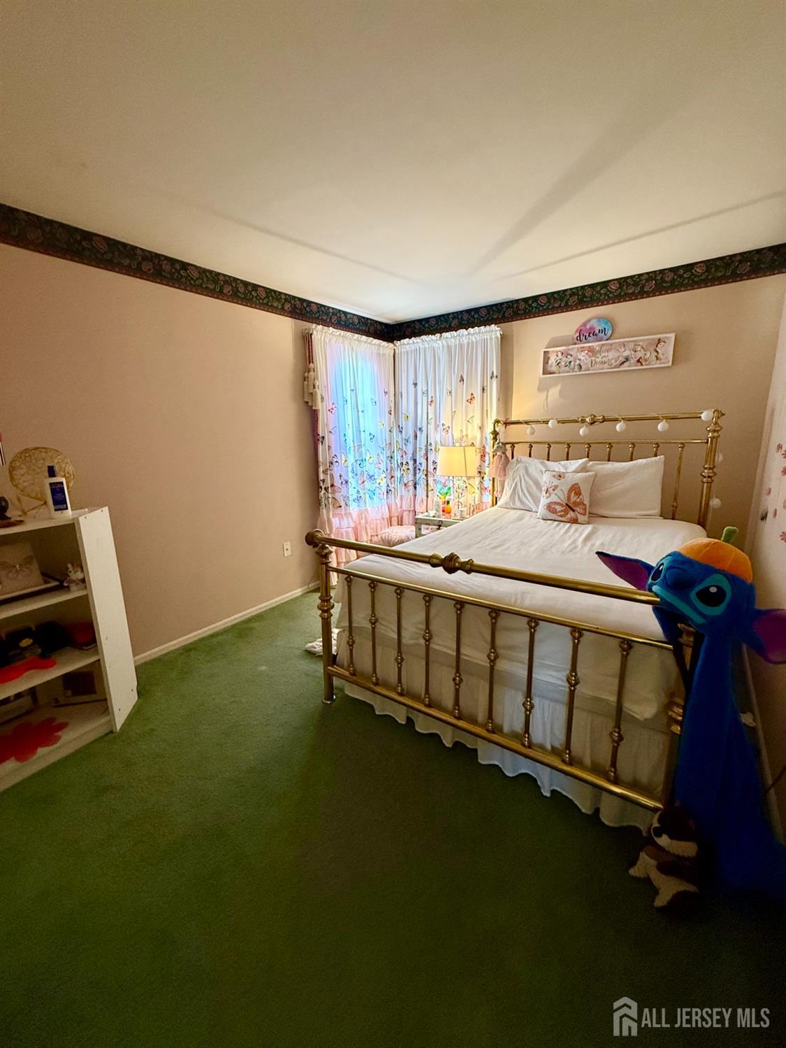 127 Disbrow Road Old Bridge, NJ 07747 - Photo 30 of 50 a bedroom with a bed wooden floor and a window