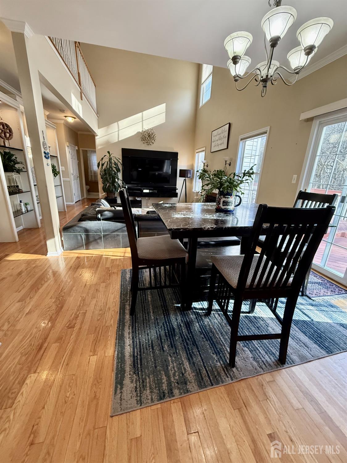 127 Disbrow Road Old Bridge, NJ 07747 - Photo 37 of 50 a view of a dining room with furniture and wooden floor