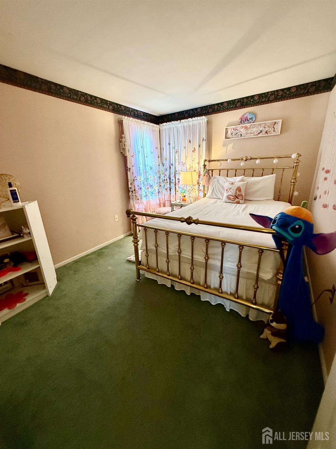 127 Disbrow Road Old Bridge, NJ 07747 - Photo 45 of 50 a bed sitting in a room next to a window