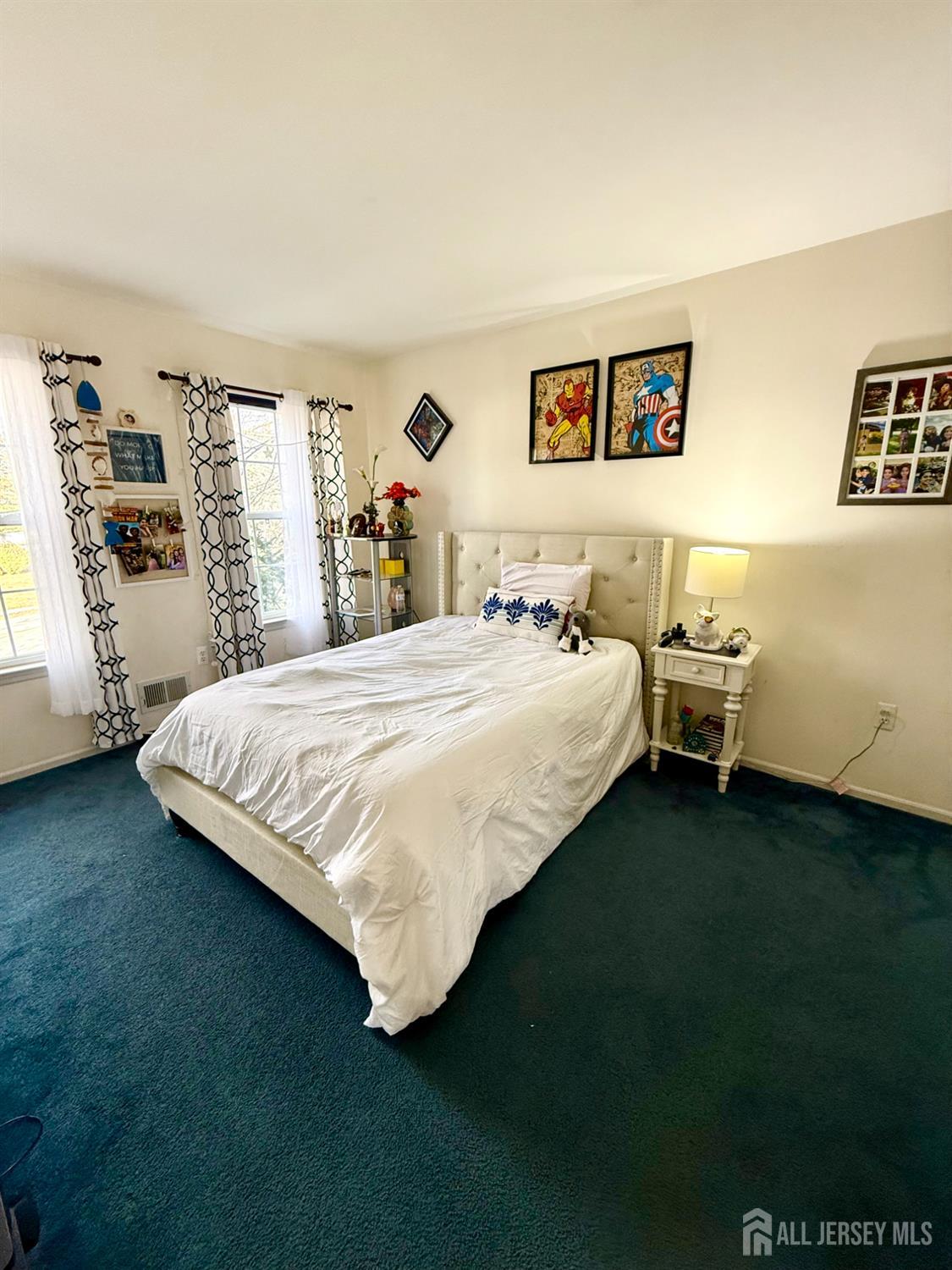 127 Disbrow Road Old Bridge, NJ 07747 - Photo 46 of 50 a bedroom with a bed and a night stand