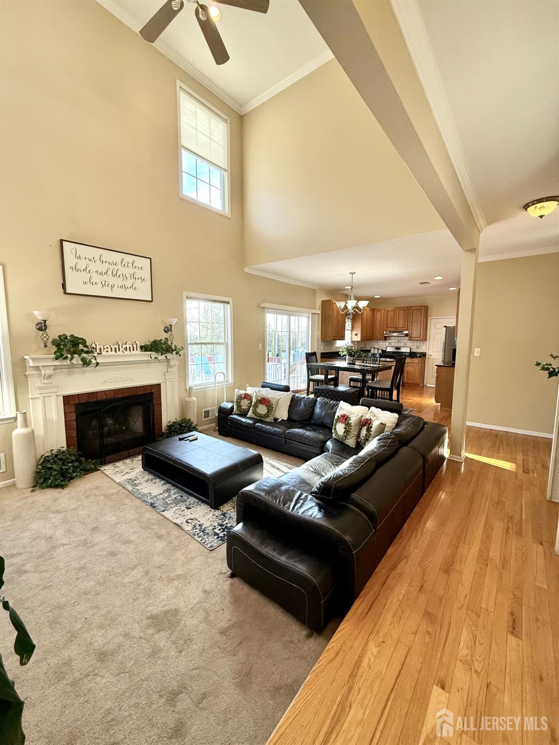 127 Disbrow Road Old Bridge, NJ 07747 - Photo 6 of 50 a living room with furniture and a fireplace