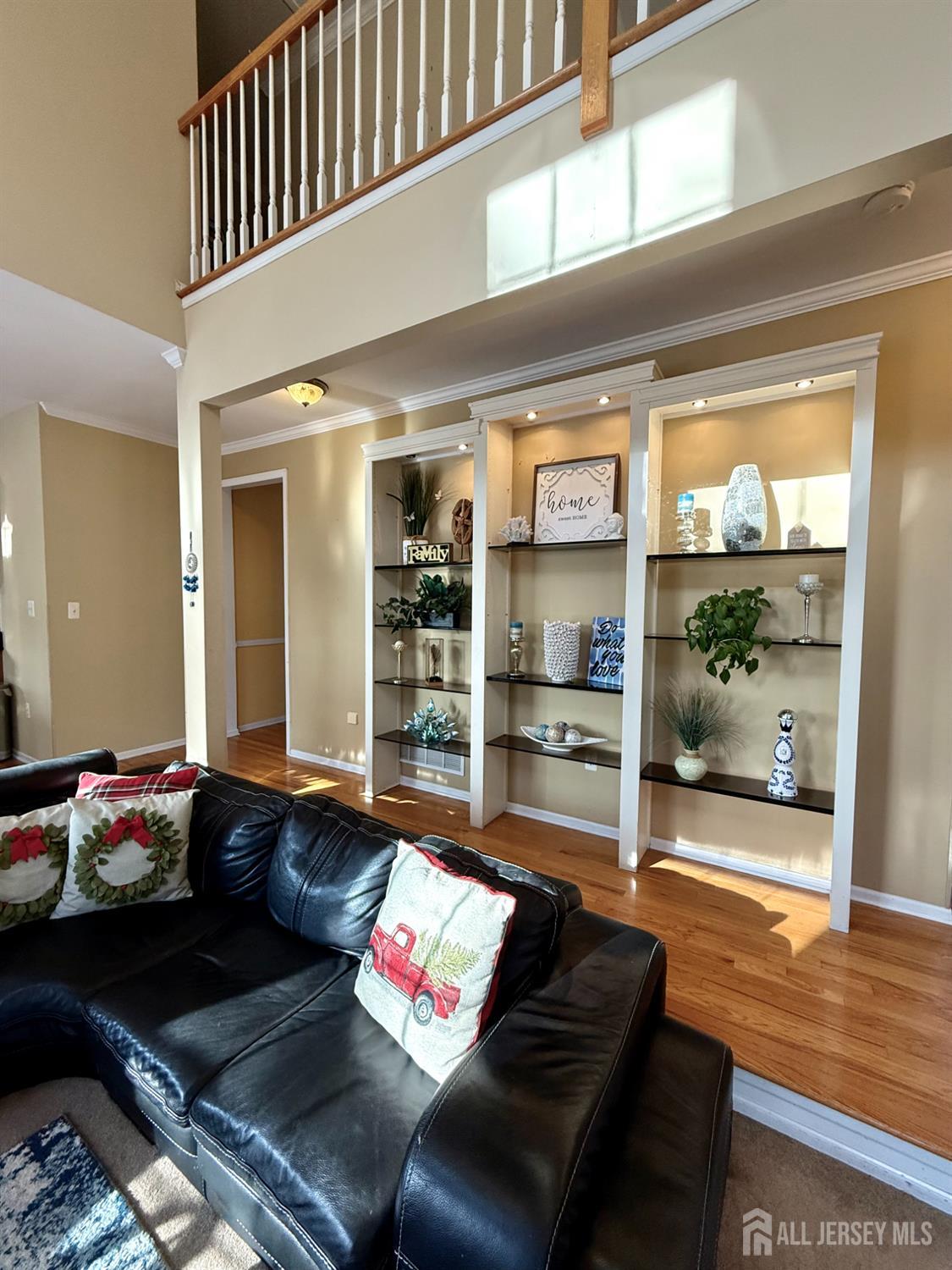 127 Disbrow Road Old Bridge, NJ 07747 - Photo 9 of 50 a living room with furniture and wooden floor