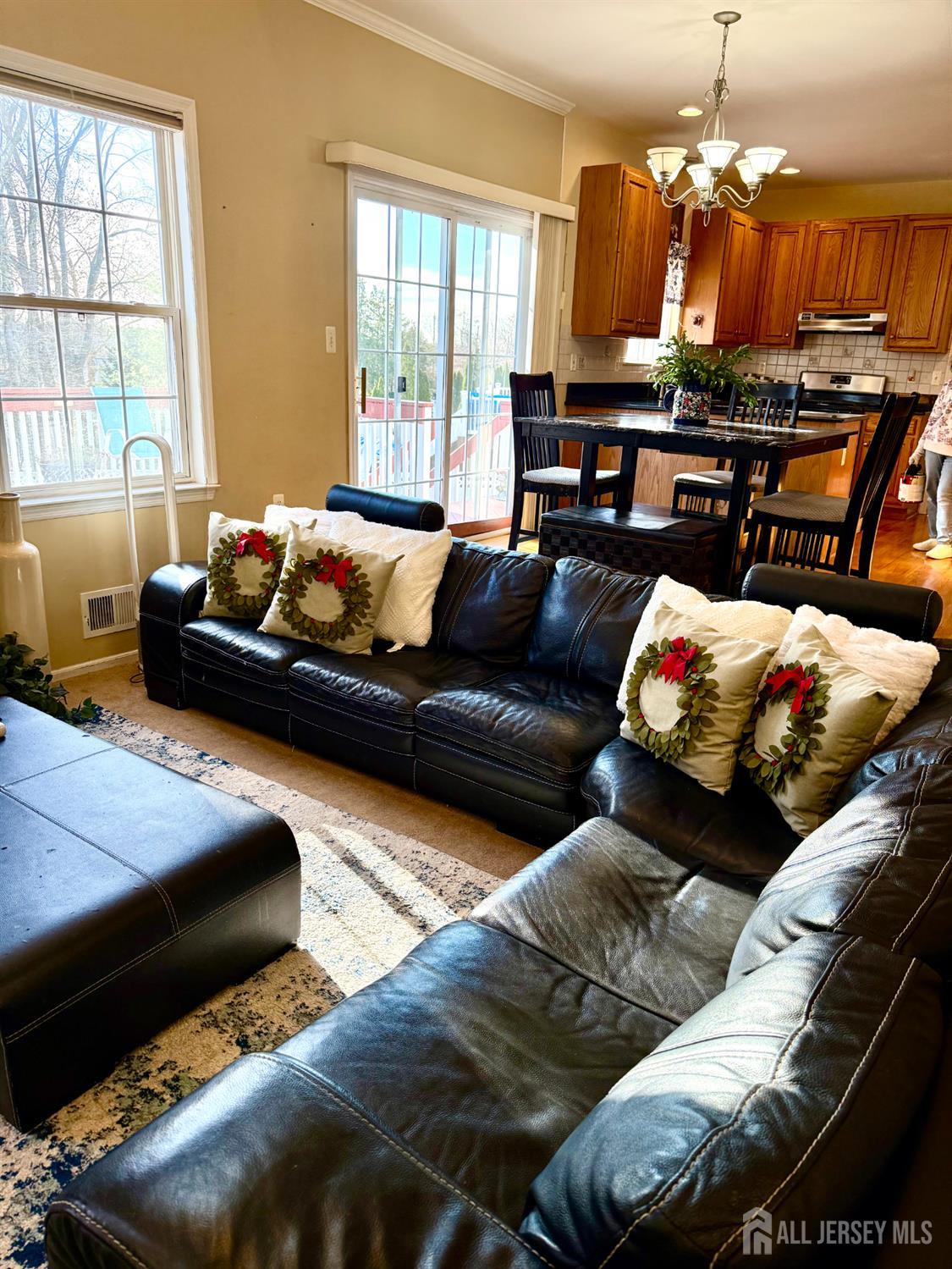 127 Disbrow Road Old Bridge, NJ 07747 - Photo 10 of 50 a living room with furniture kitchen view and a window