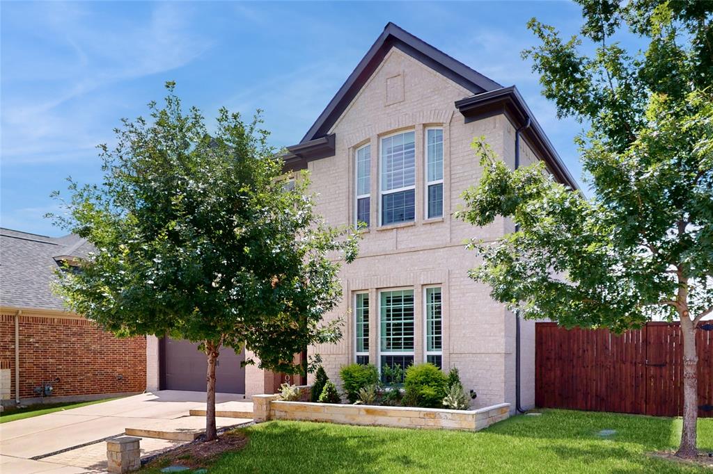 1997 Kieva Place Allen, TX 75013 - Photo 2 of 40 Traditional-style house featuring brick siding, a garage, and concrete driveway