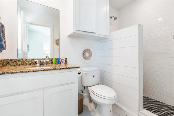 a view of hallway with wooden floor