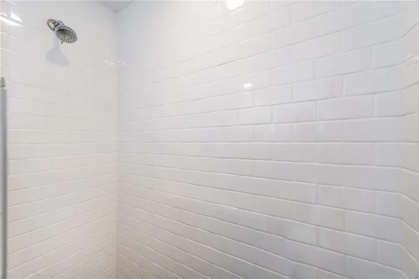 a bedroom with a bed and a table in it