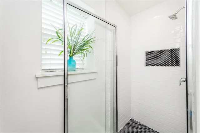 a view of a house with swimming pool and sitting area