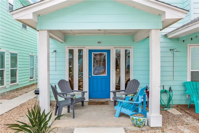 a front view of house with outdoor seating