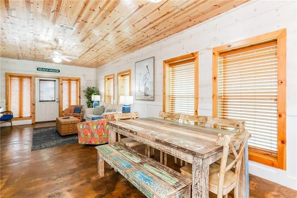 a view of a dining room with furniture