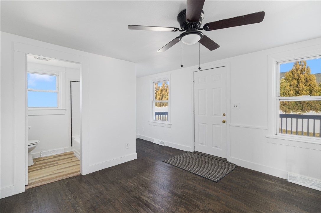 1609 West Main Road Middletown, RI 02842 - Photo 7 of 31 Living Room to Bath & Front Door
