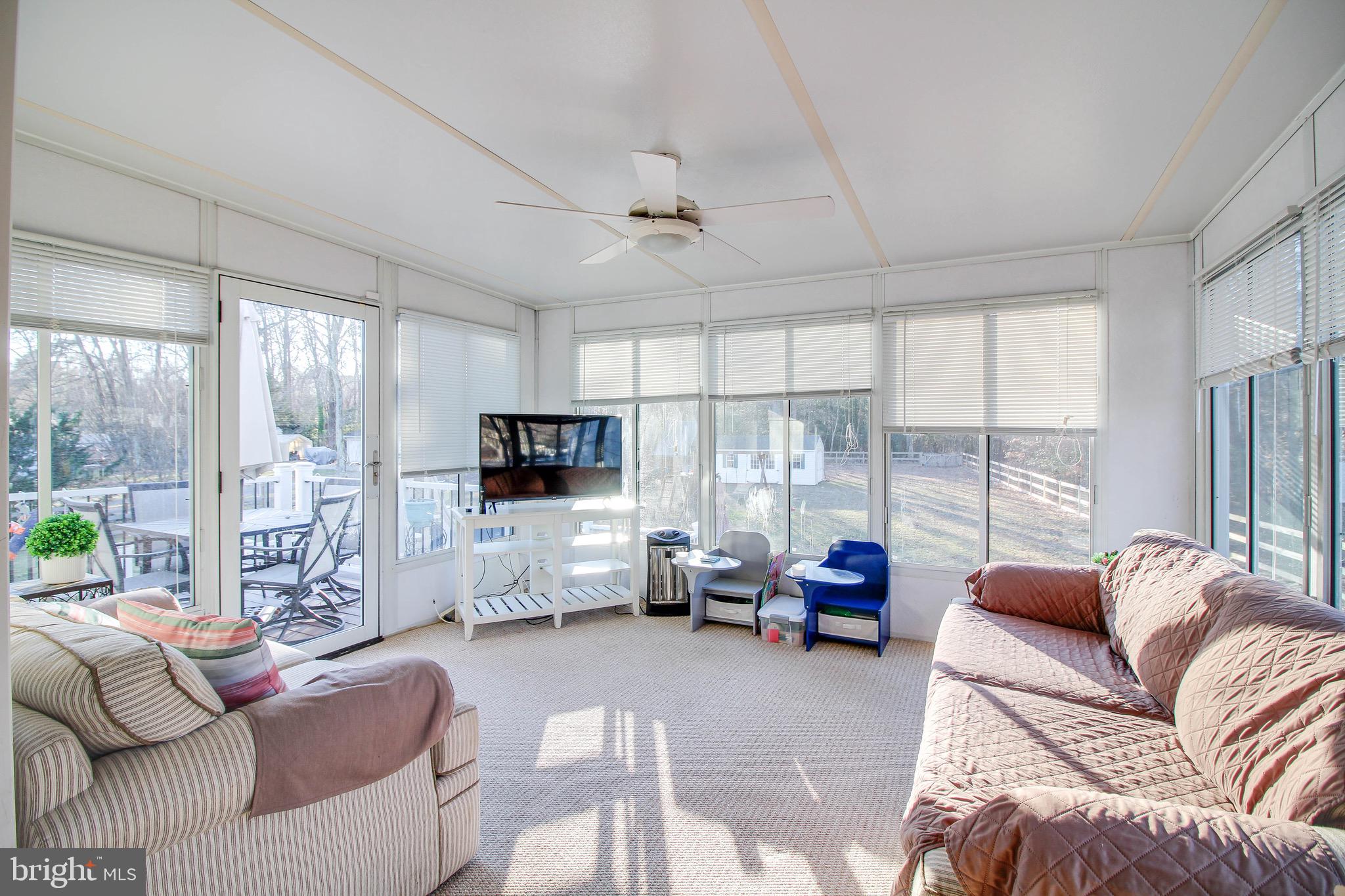 8000 Solley Road Glen Burnie, MD 21060 - Photo 13 of 44 a living room with furniture or couch and a large window
