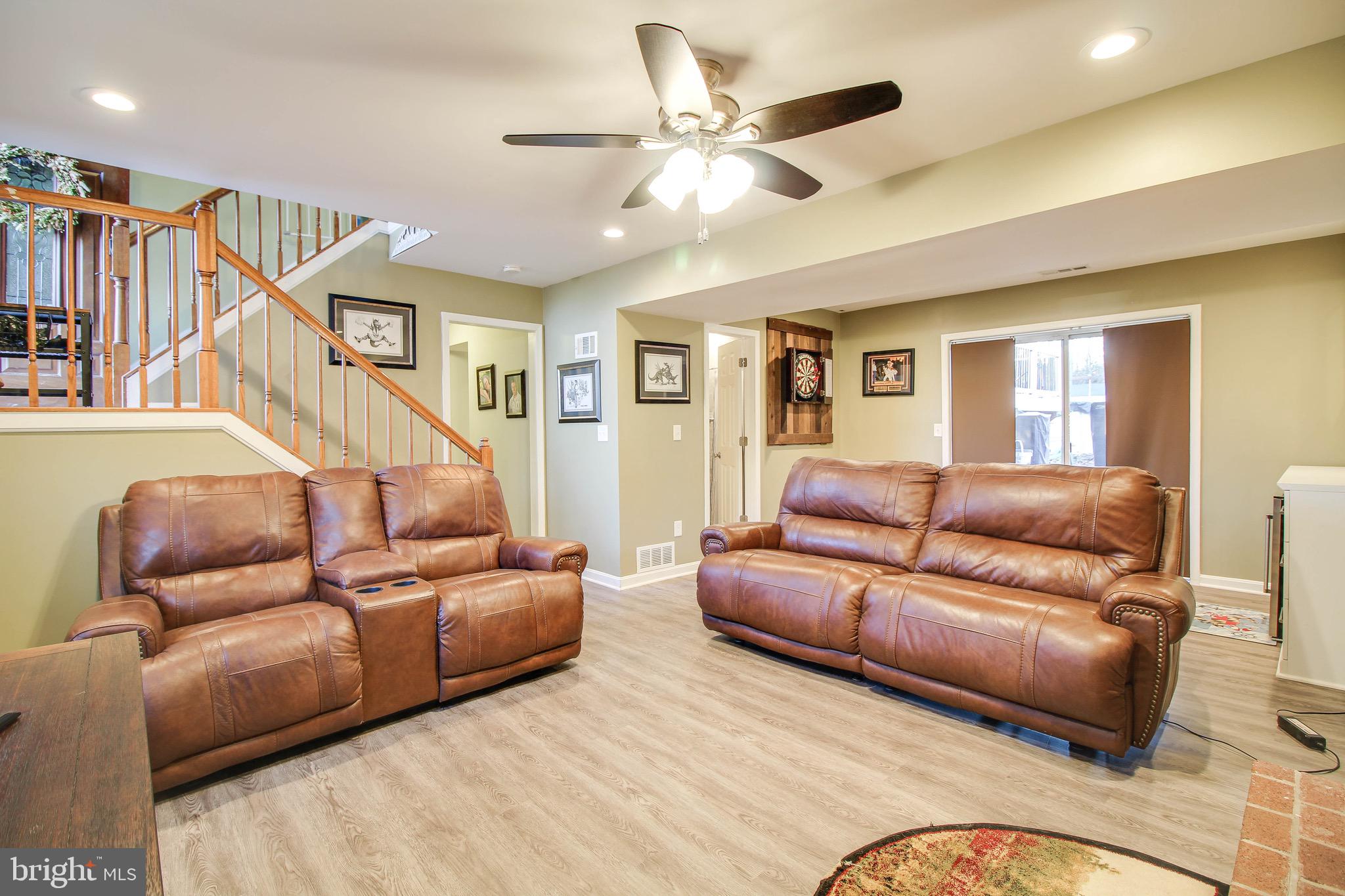 8000 Solley Road Glen Burnie, MD 21060 - Photo 24 of 44 a living room with furniture and a ceiling fan