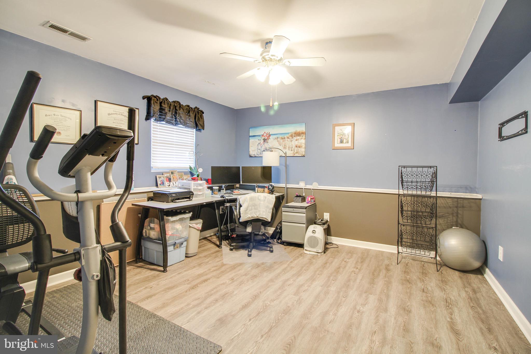 8000 Solley Road Glen Burnie, MD 21060 - Photo 26 of 44 a workspace with a couch and a chandelier