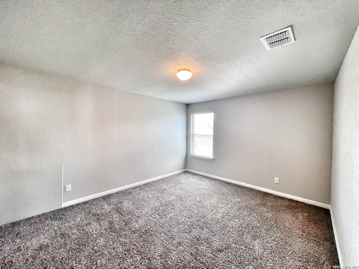 1224 Loma Ranch New Braunfels, TX 78132 - Photo 21 of 29 an empty room with windows and closet