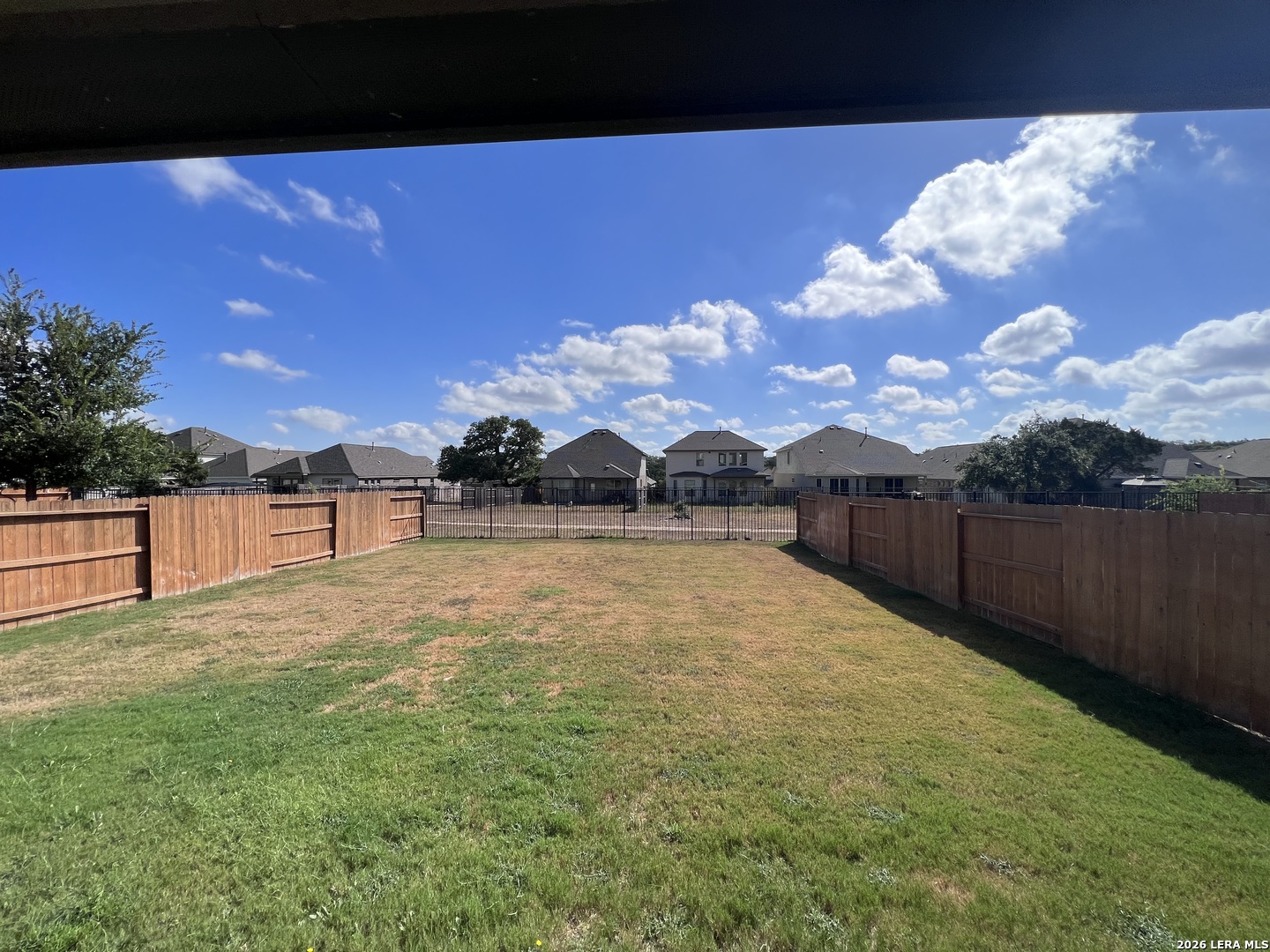 1224 Loma Ranch New Braunfels, TX 78132 - Photo 24 of 29 a view of backyard with swimming pool and seating