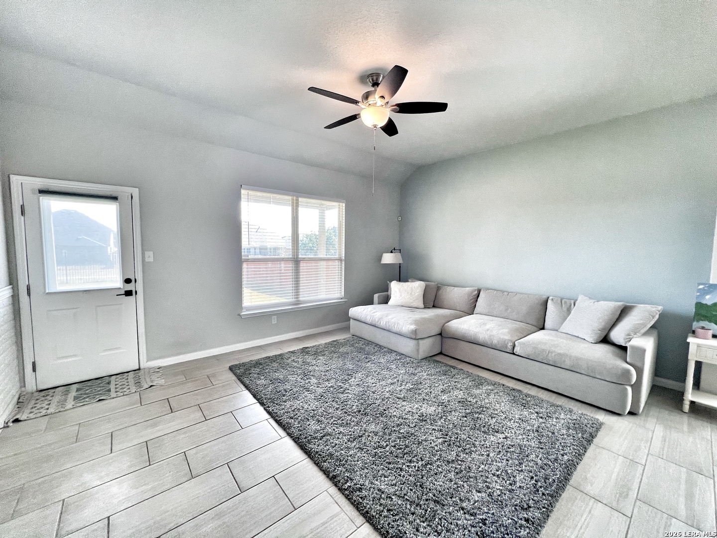 1224 Loma Ranch New Braunfels, TX 78132 - Photo 7 of 29 a living room with furniture and a rug