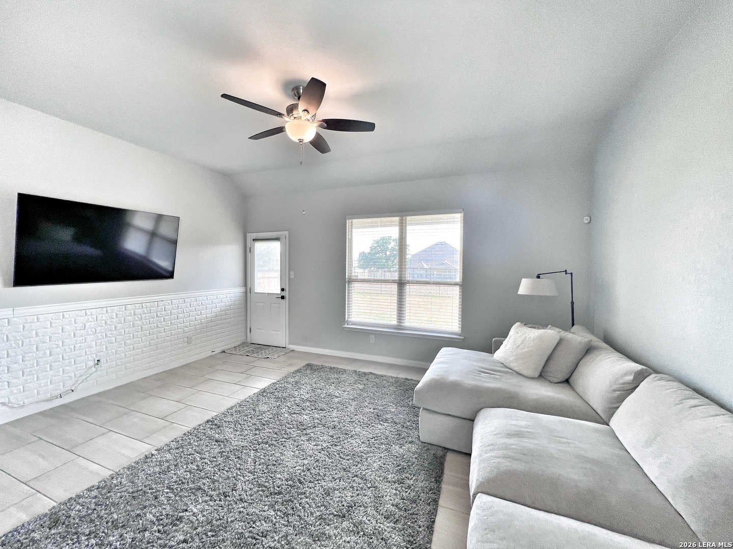 1224 Loma Ranch New Braunfels, TX 78132 - Photo 8 of 29 a living room with furniture and a flat screen tv