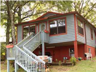 873 Squirrel Road DeFuniak Springs, FL 32433 - Photo 1 of 1 a front view of house with yard