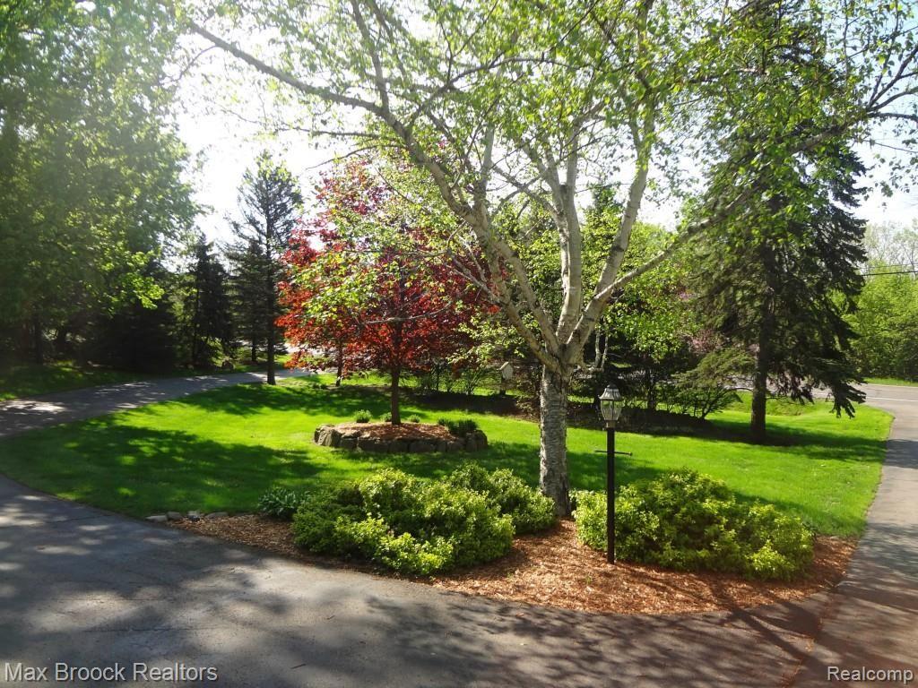 4740 West Maple Road Bloomfield Hills, MI 48301 - Photo 3 of 14 Professionally Landscaped.