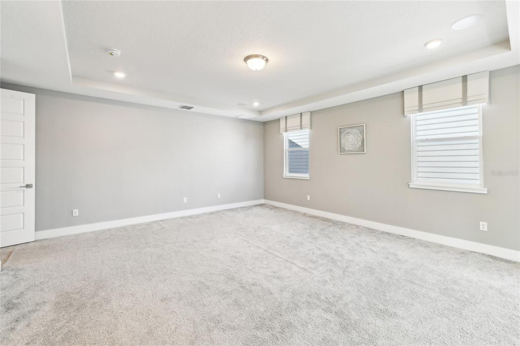 6054 Bimini Twist Loop Orlando, FL 32819 - Photo 58 of 76 a view of an empty room with a window