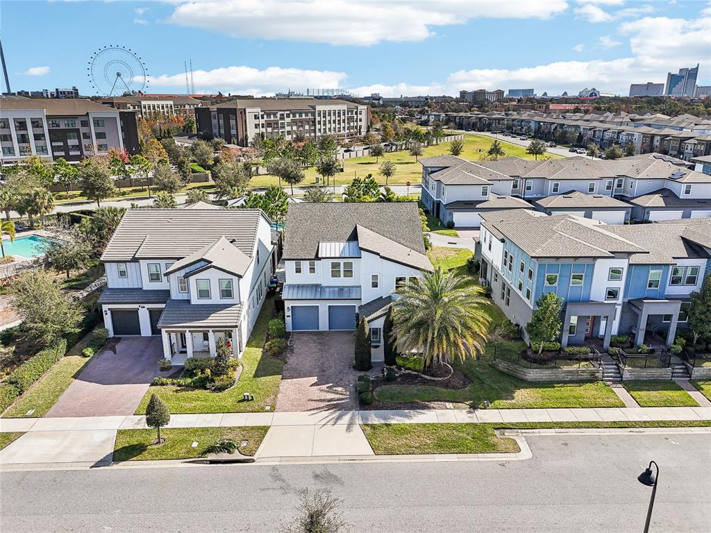 6054 Bimini Twist Loop Orlando, FL 32819 - Photo 72 of 76 an aerial view of residential houses with yard
