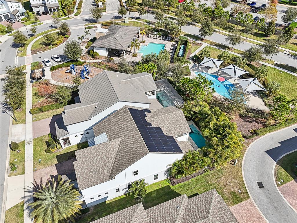 6054 Bimini Twist Loop Orlando, FL 32819 - Photo 75 of 76 an aerial view of a house with a yard and trees
