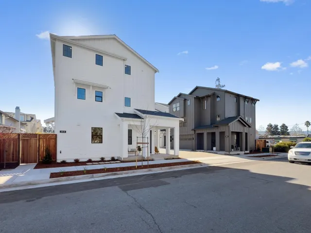 a view of a two chair and a table in a room
