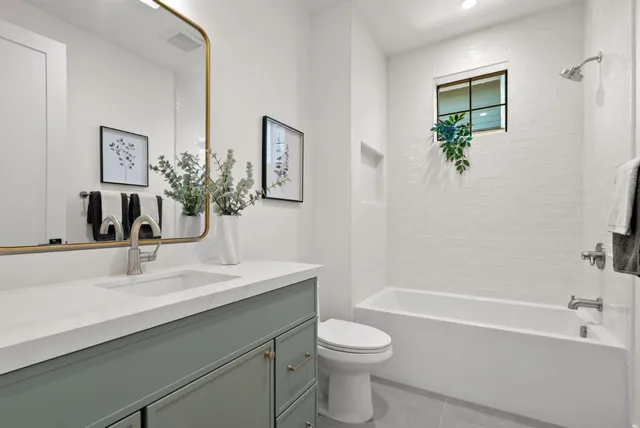 a view of a city with mountains in the background