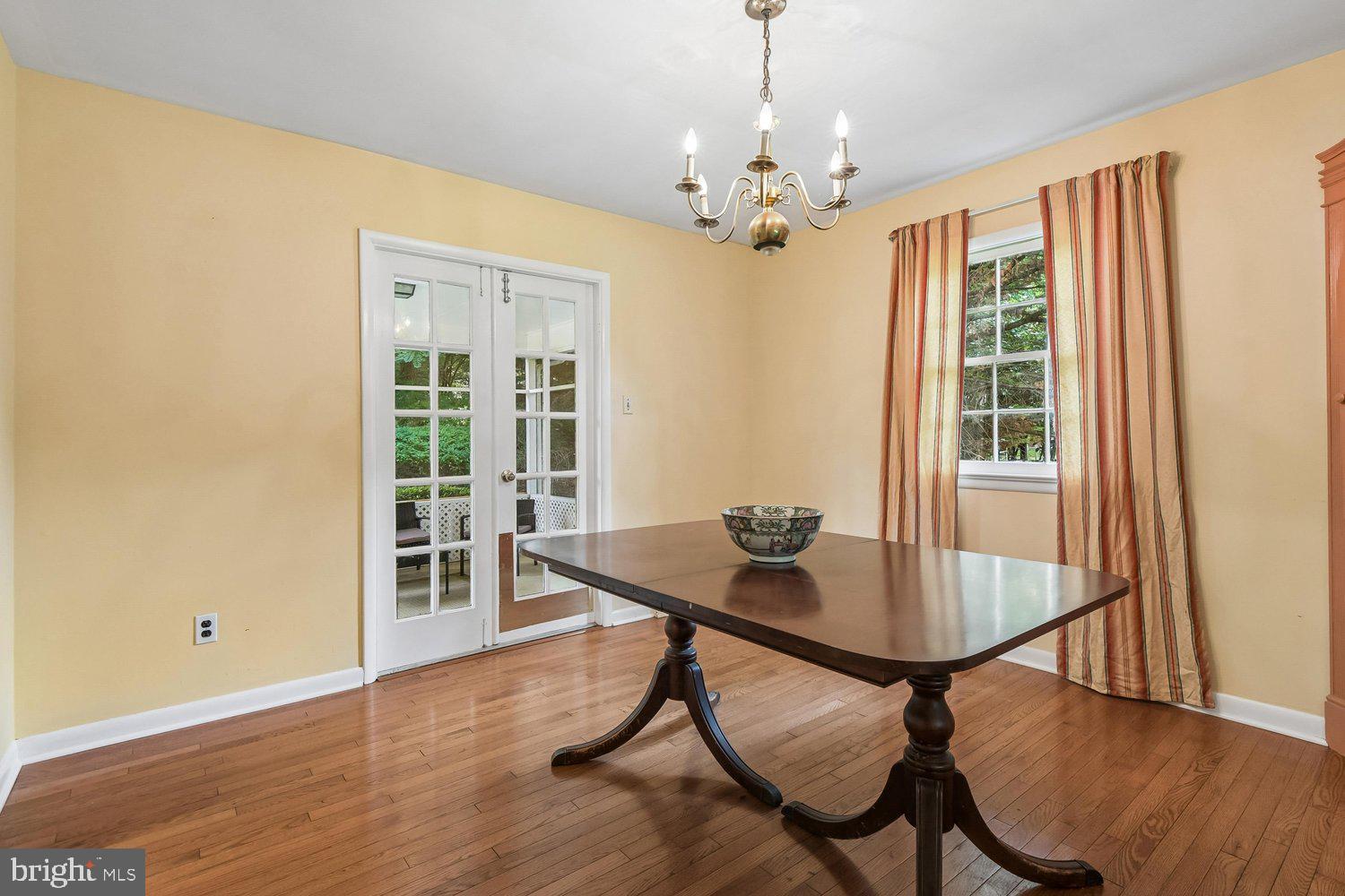 1518 Winchester Road Annapolis, MD 21409 - Photo 16 of 70 a view of a dining room with furniture window and wooden floor
