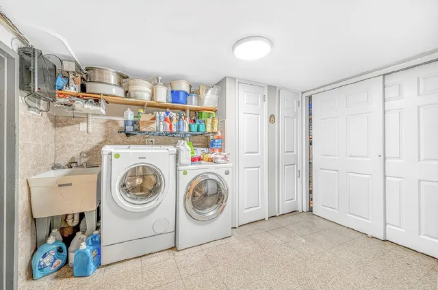 a utility room with dryer and washer