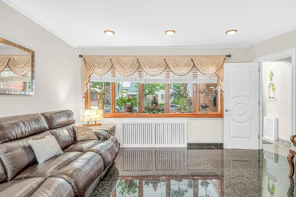 $1,390,000 | 48-18 190th Street | Auburndale