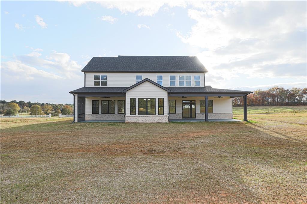 1341 Wheeler Creek Road Maysville, GA 30558 - Photo 50 of 51 a front view of house with yard and lake view