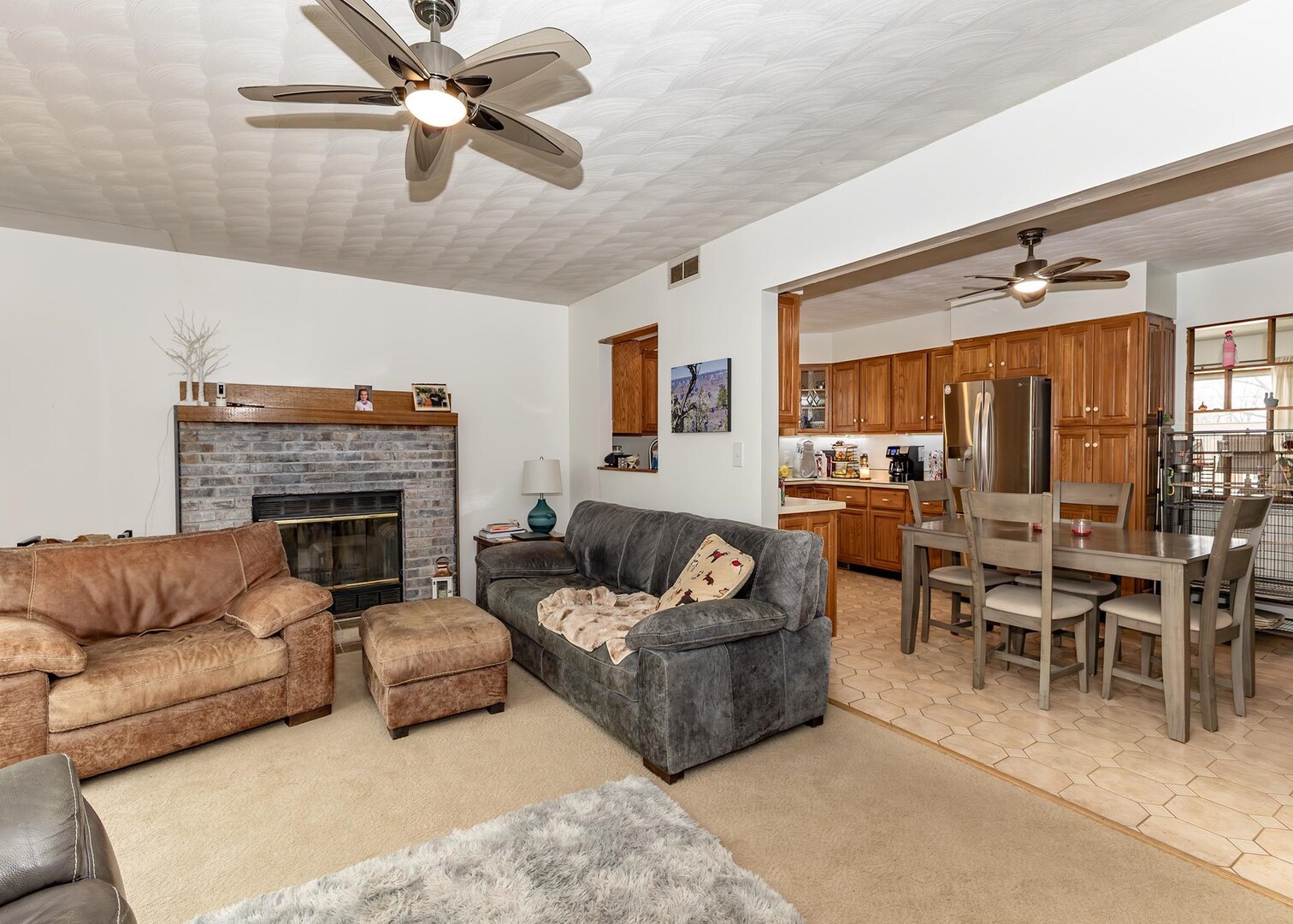 564 Scenic Drive Clinton, IA 52732 - Photo 12 of 26 a living room with furniture and a fireplace