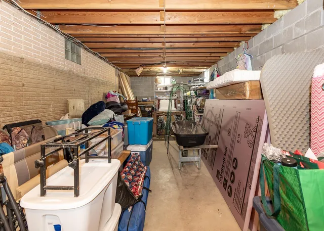 a view of a chairs and table in patio