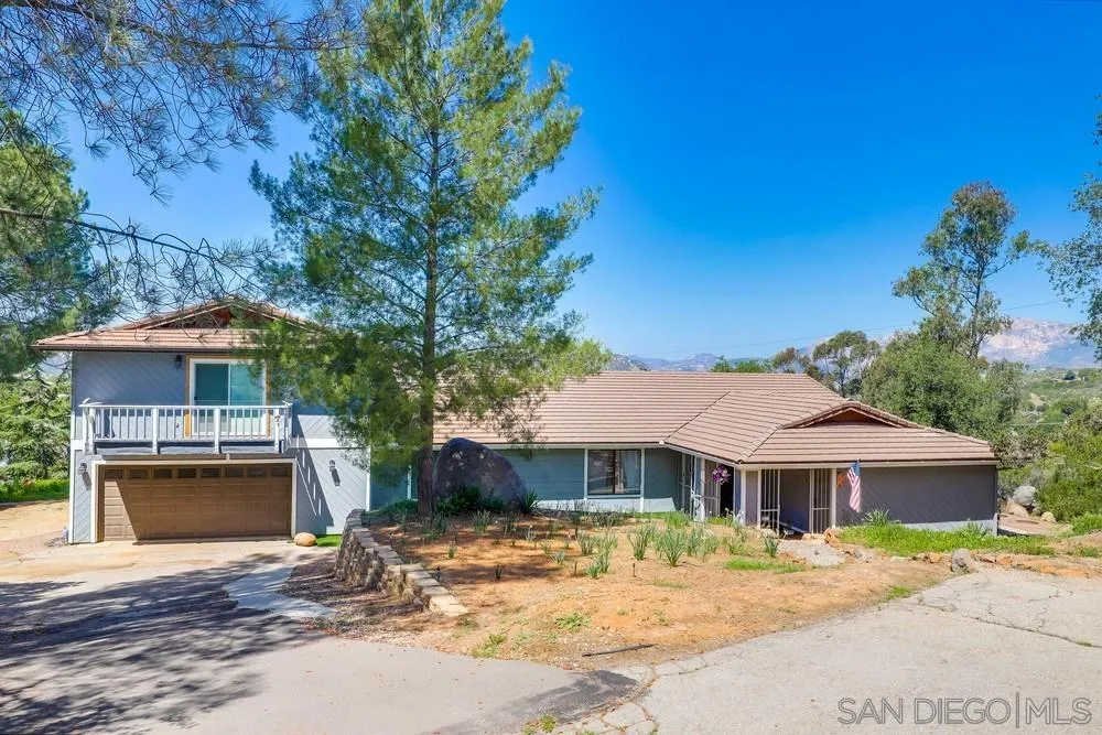 1125 South Grade Road Alpine, CA 91901 - Photo 2 of 50 a front view of a house with a yard