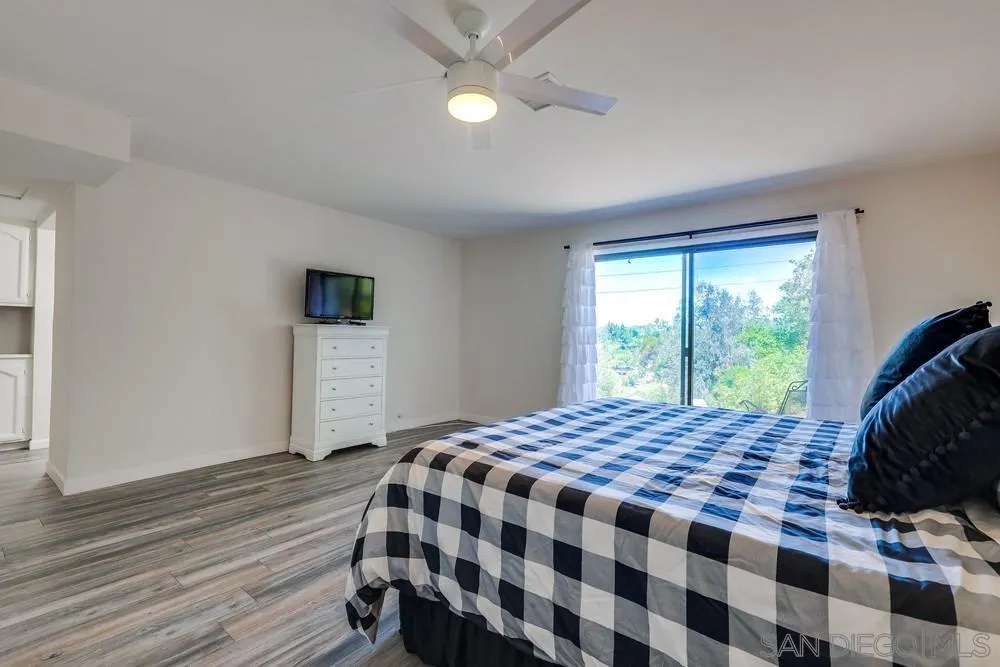 1125 South Grade Road Alpine, CA 91901 - Photo 23 of 50 a bedroom with a bed and a window