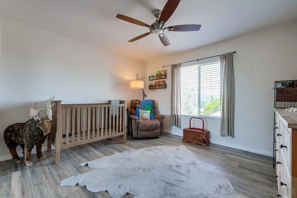1125 South Grade Road Alpine, CA 91901 - Photo 29 of 50 a living room with furniture and a window