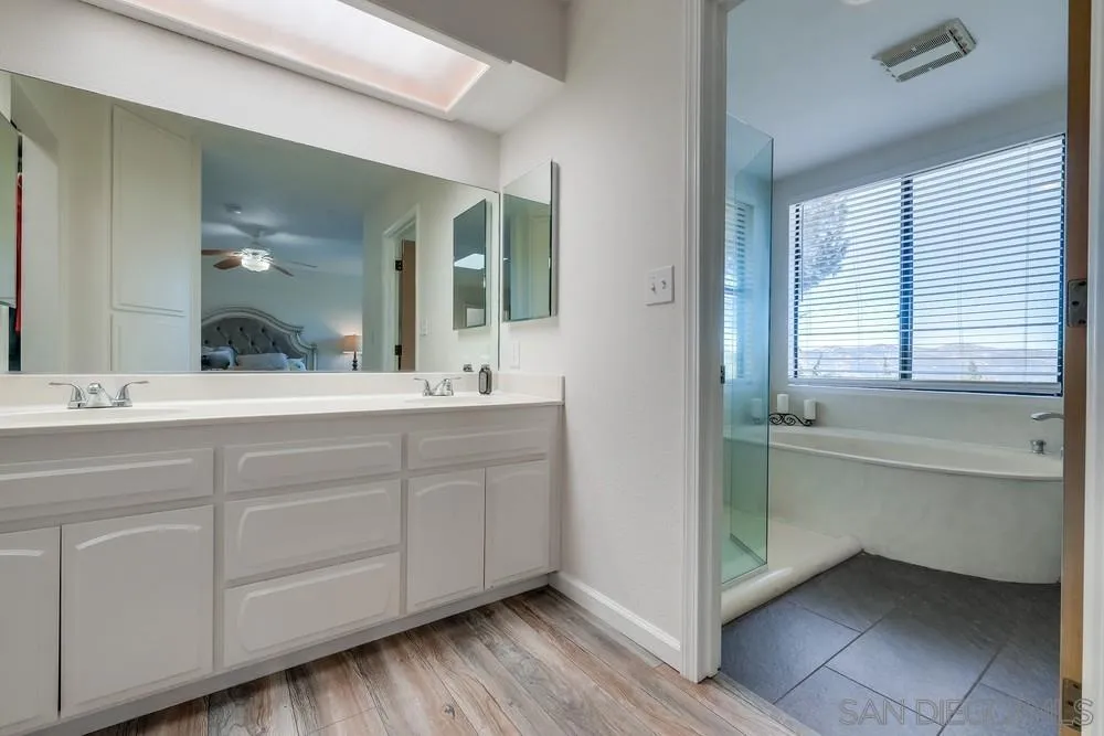 1125 South Grade Road Alpine, CA 91901 - Photo 34 of 50 a bathroom with a sink and a mirror