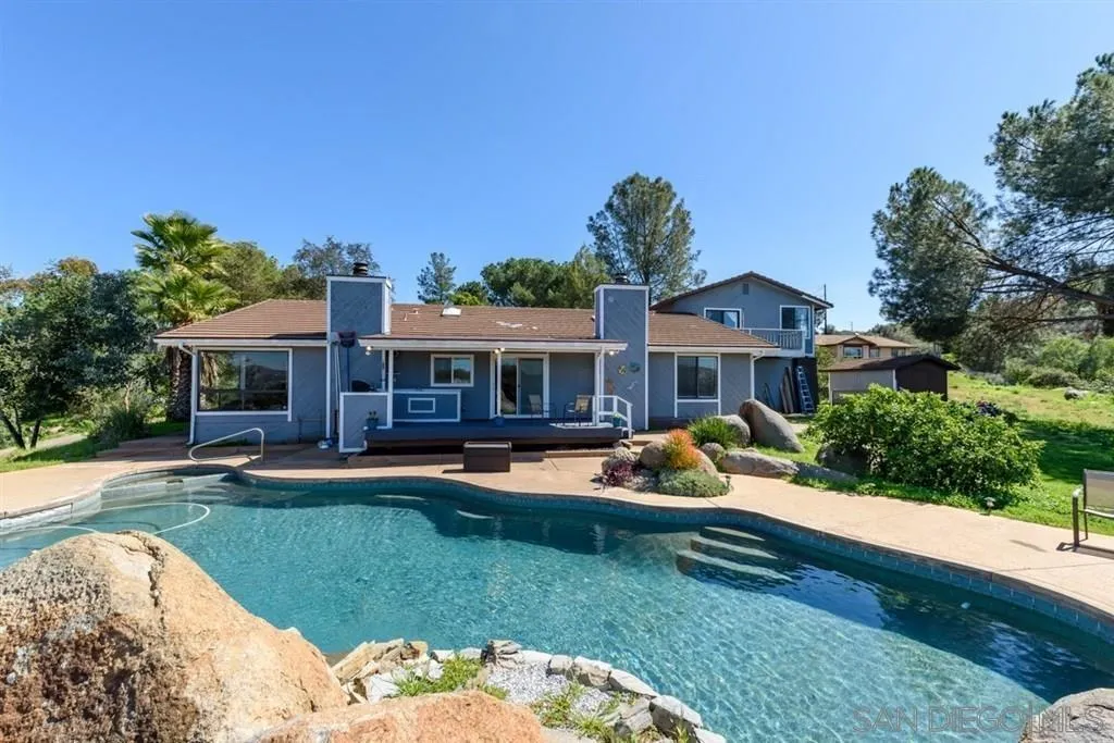 1125 South Grade Road Alpine, CA 91901 - Photo 40 of 50 a front view of a house with swimming pool having outdoor seating