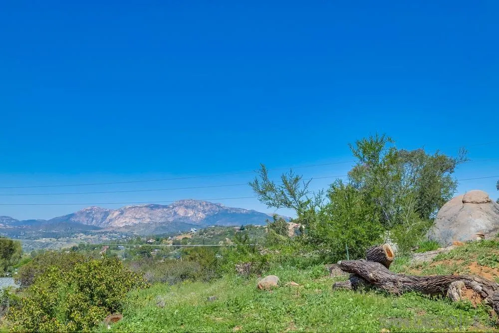 1125 South Grade Road Alpine, CA 91901 - Photo 49 of 50 a view of a lake with a mountain in the background