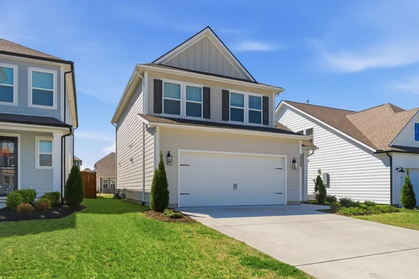 a front view of house with yard