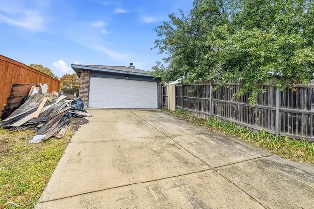 a view of backyard and entertaining space
