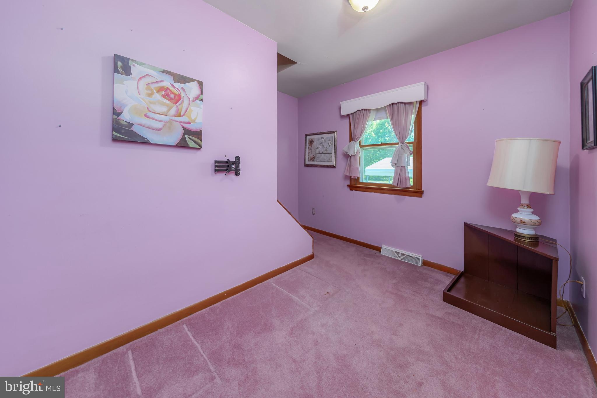 121 Kansas Road Pennsville, NJ 08070 - Photo 15 of 32 a view of livingroom with furniture and a window