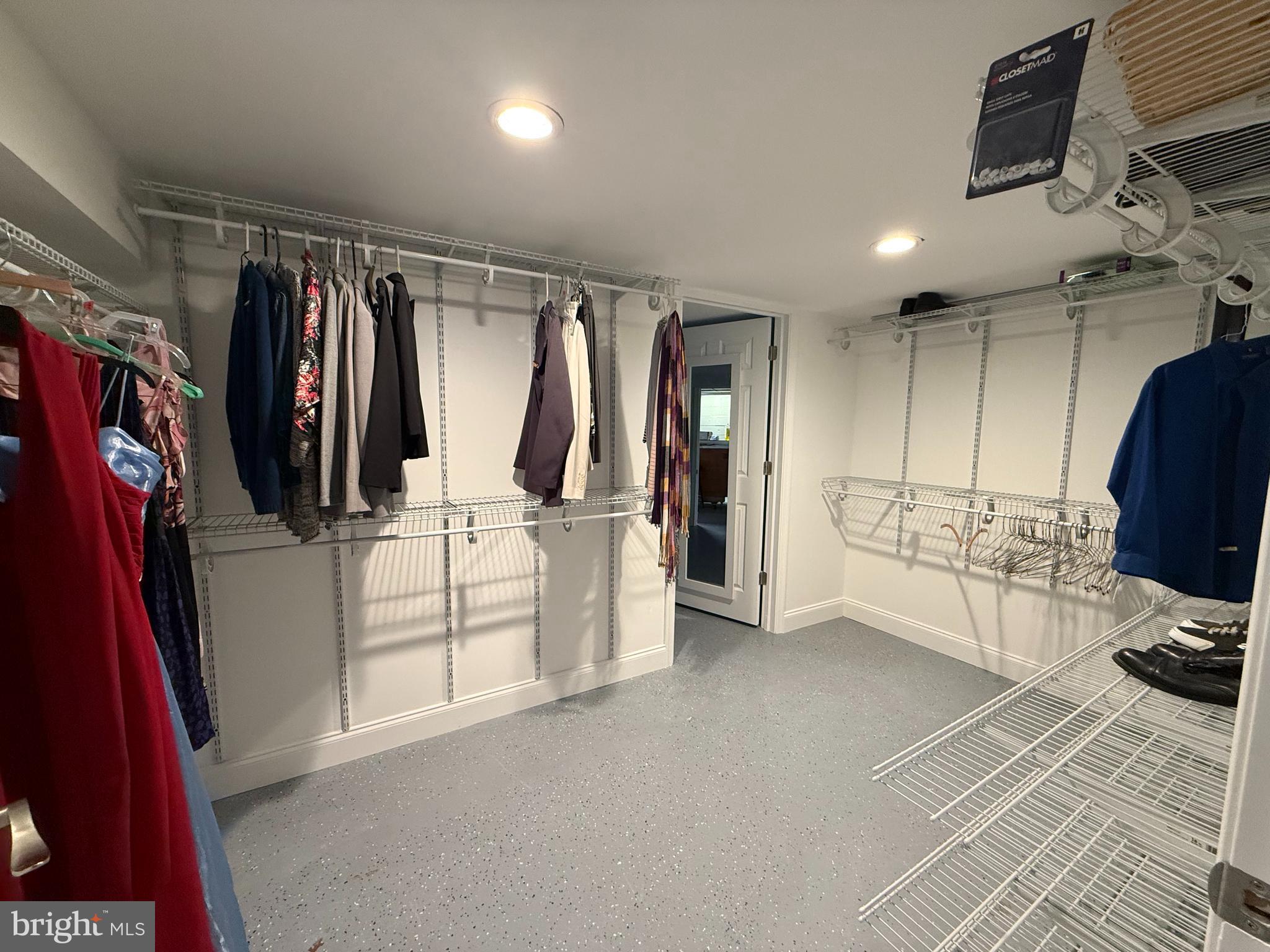 121 Kansas Road Pennsville, NJ 08070 - Photo 20 of 32 a view of walk in closet with clothes and shoes